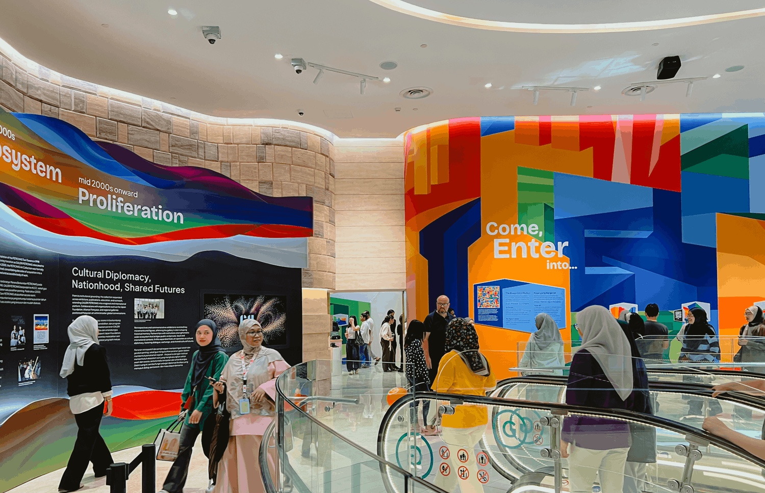 Visitors inside Galeri PETRONAS First Glimpse on the ground floor of Ombak KLCC