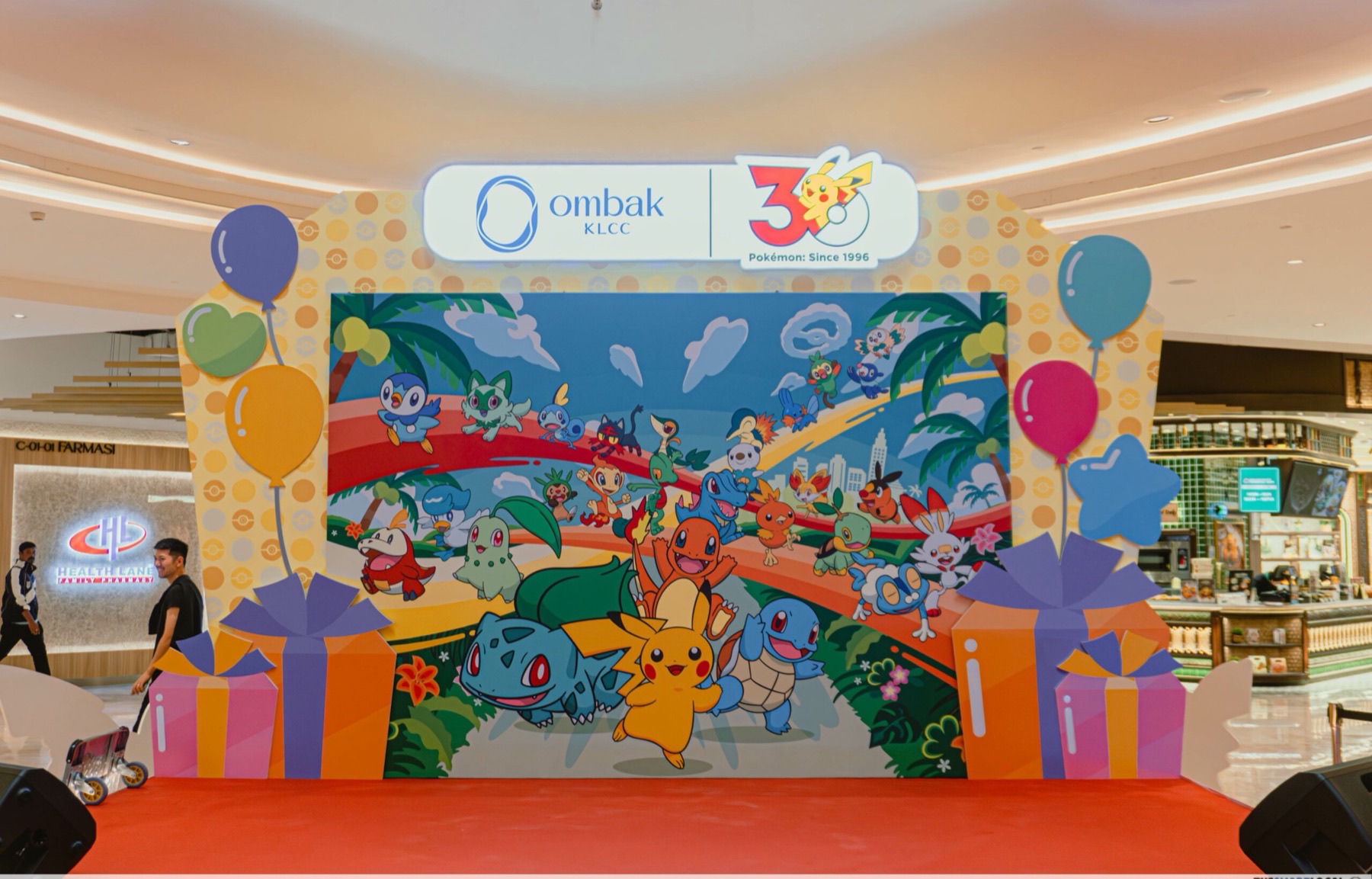 Pokémon 30th Anniversary photo wall on the Ombak KLCC concourse beside Health Lane